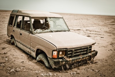 sunken in mud car