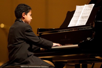 Concert, UAE, boy playing piano