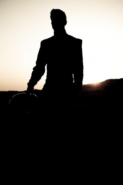 silhouette of race driver